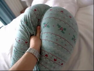 family clothed in bed fingering